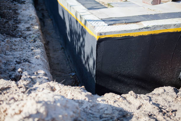 Professional Emergency Waterproofing technician working in Huntsville, OH
